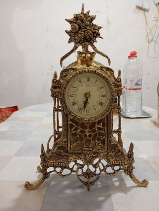 Reloj bronce antiguo