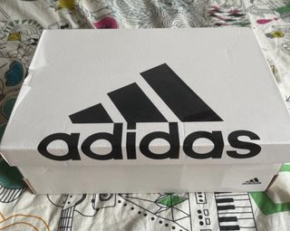 Zapatillas Adidas blancas y azules