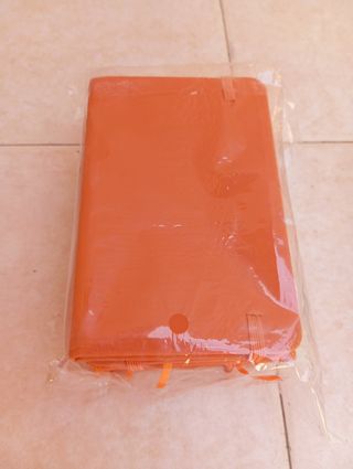 Libretas nuevas color naranja