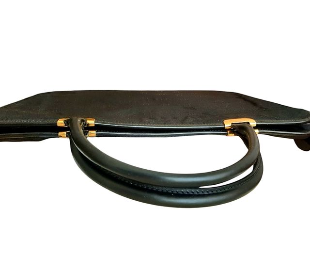 Bolso Dior vintage negro y dorado