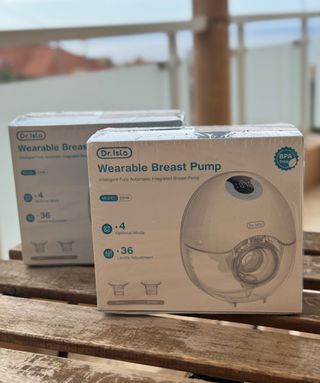 Extractor de leche portátil sin estrenar.