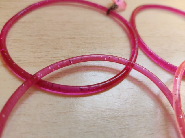 Pulseras plastico brillantes rosa