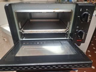 Horno eléctrico pequeño marca Ansonic,casi nuevo.