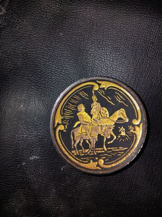 Medalla damasquinada antigua 