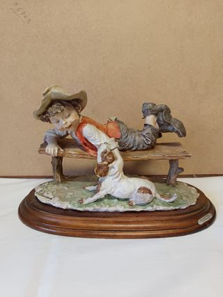 Figura Guido Medici: Niño con perro