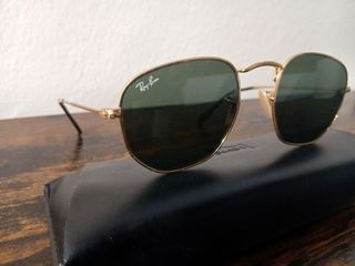 Ray Ban hexagonales doradas