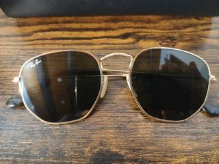 Ray Ban hexagonales doradas