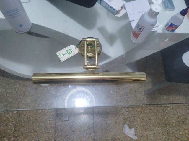 Lampara de lectura dorada