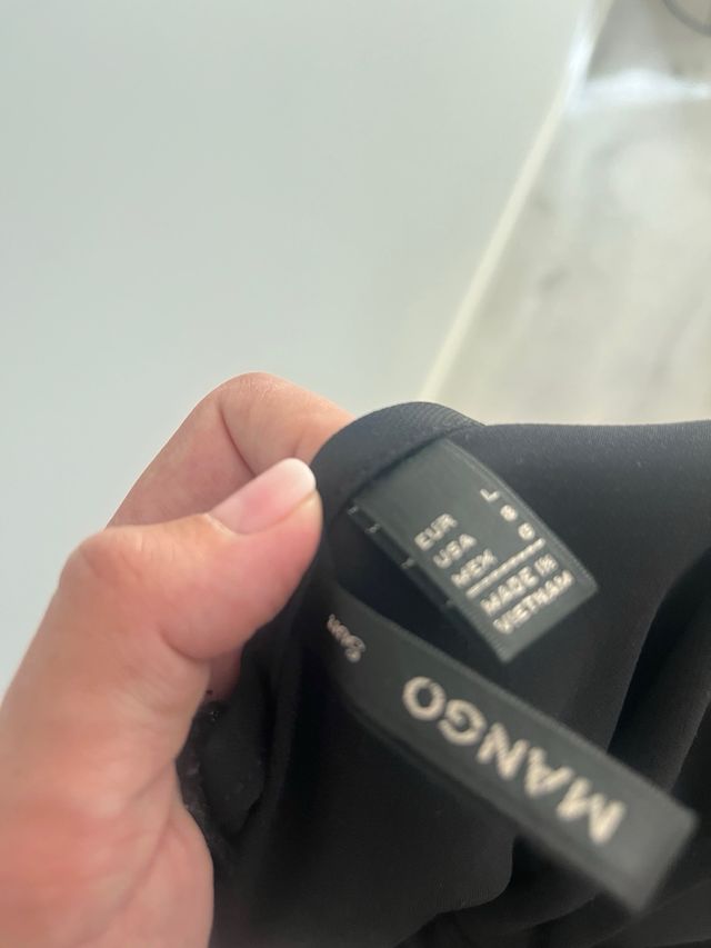 Mono Mango negro elegante