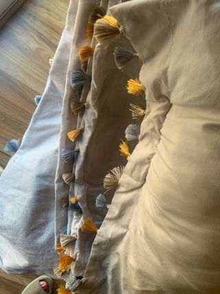 Fundas nórdicas beige y grises con borlas