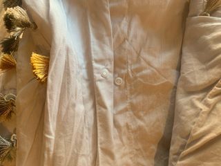 Fundas nórdicas beige y grises con borlas