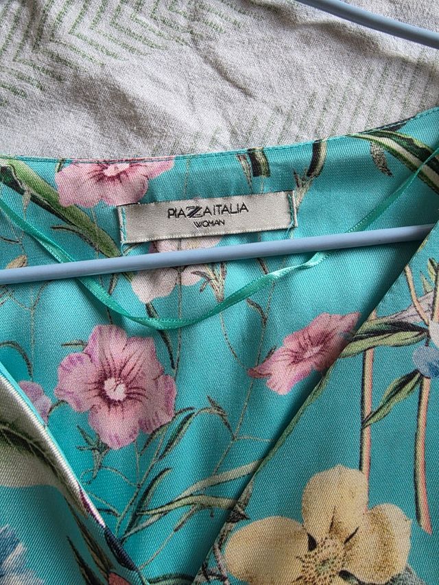 Blusa floreale celeste