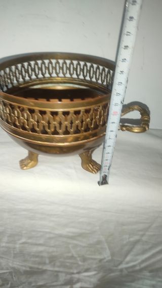 Antigua carbonera bronce centro mesa león