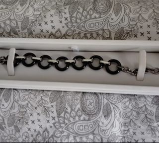 Pulsera Lotus acero, plateada y negra.