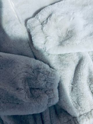 Giacca di pelliccia grigia