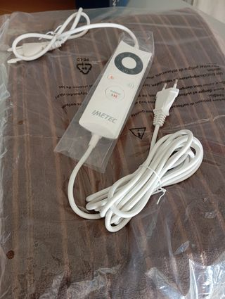 Manta eléctrica beige y marrón