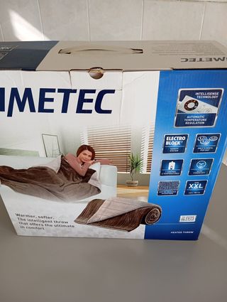 Manta eléctrica beige y marrón