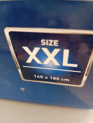 Manta eléctrica beige y marrón