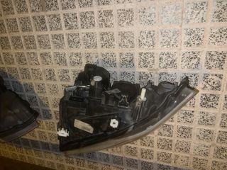 Faros Delanteros  ORIGINALES  BMW Serie 3 2010