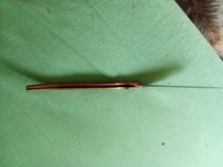 Coltello pieghevole legno metallo