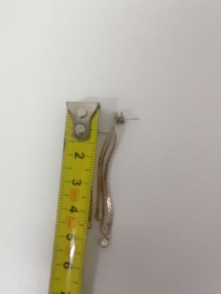 Pendientes plateados largos con circonitas