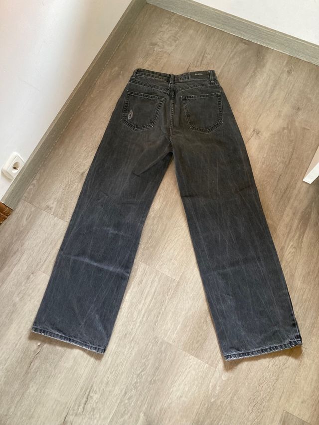 Vaqueros negros rotos 