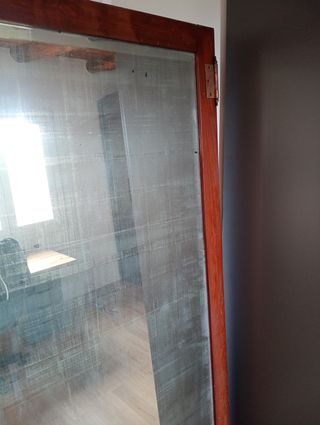 Espejo con marco de madera
