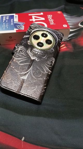  Telefono Xiaomi Redmi 14C y funda Calavera