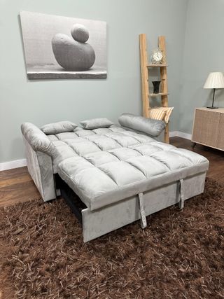Sofá cama gris terciopelo