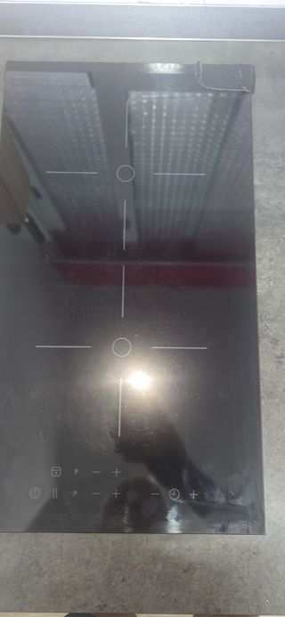 Placa inducción - Perfe estado solo en una esquina