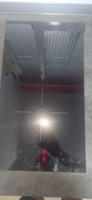 Placa inducción - Perfe estado solo en una esquina