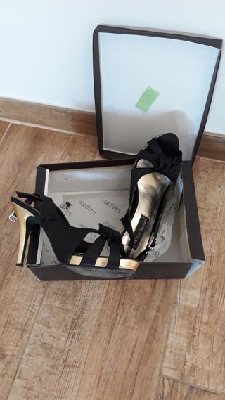 Zapatos fiesta It's Just Woman negros y dorados