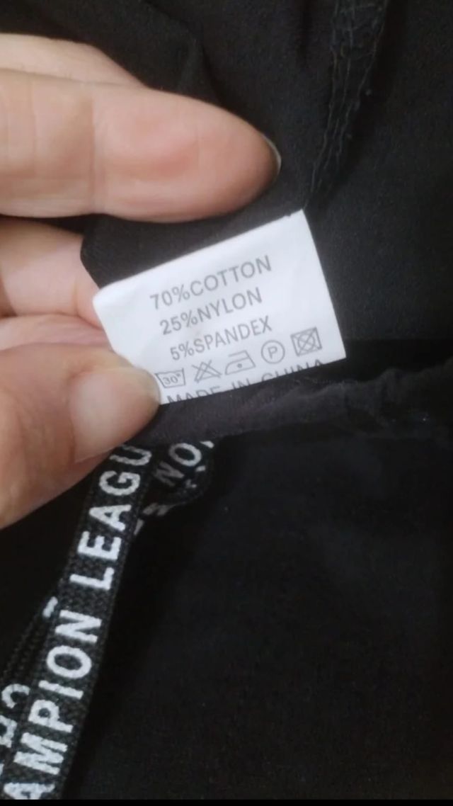 Pantalón negro mujer bolsillos, tiro alto.