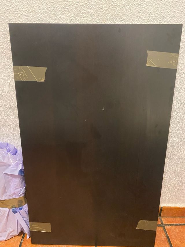 Mesa baja negra de madera. 90x55