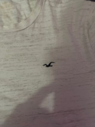 Camiseta Hollister blanca efecto desgastado