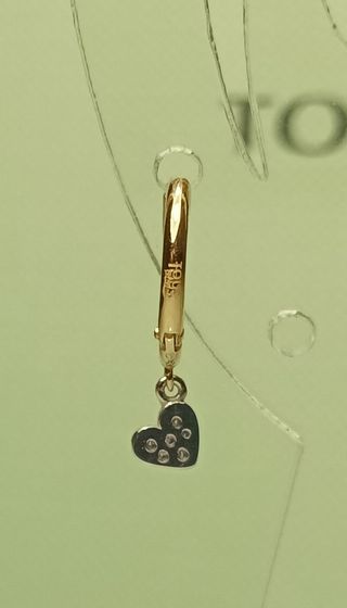 Tous piercing criolla oro 18k y brillantes.
