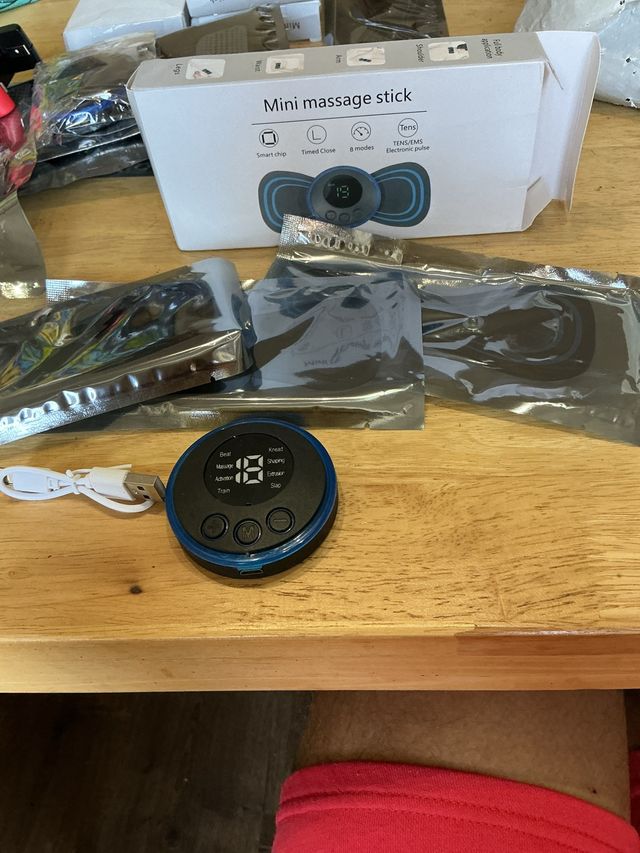 Mini masajeador eléctrico