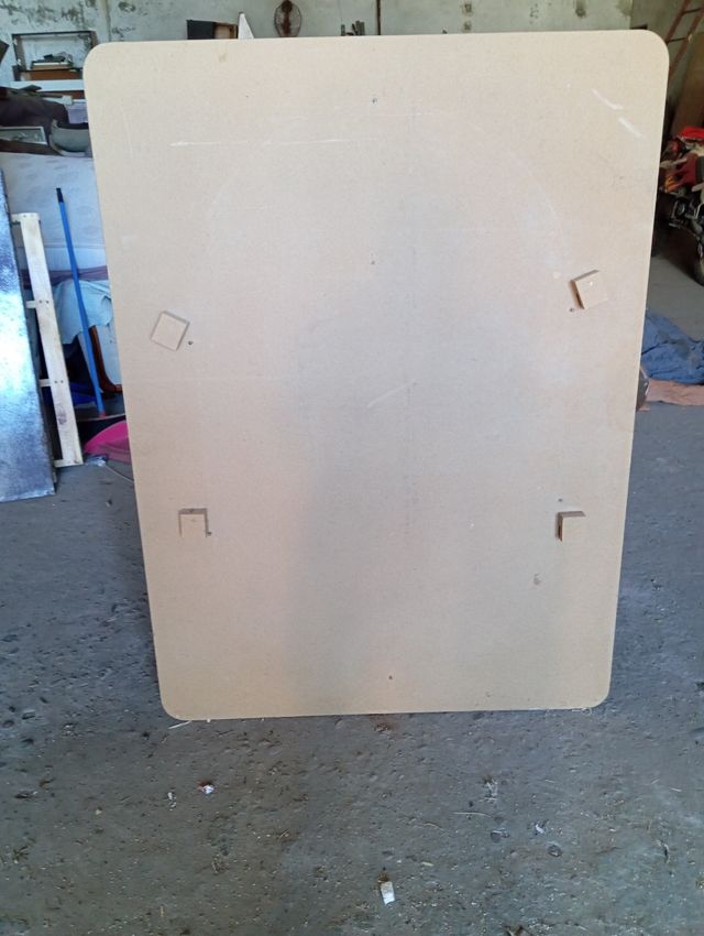 Mesa de madera y patas de hierro