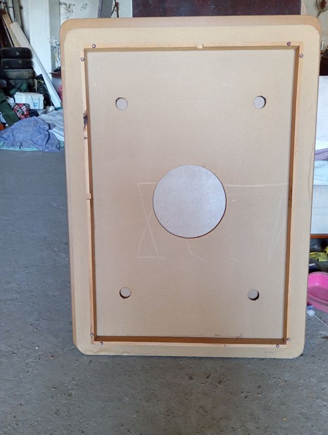 Mesa de madera y patas de hierro