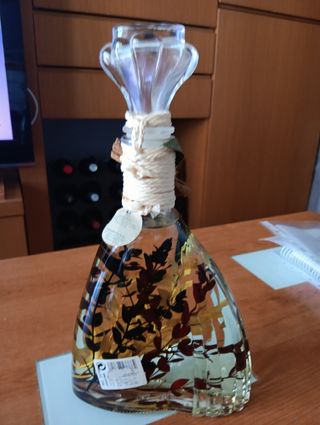 Botella aceite corporal decorativa