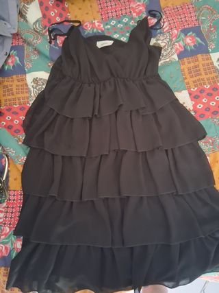 Vestito nero a balze