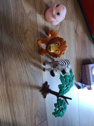 Juguetes animales: león, cebra, hipopótamo