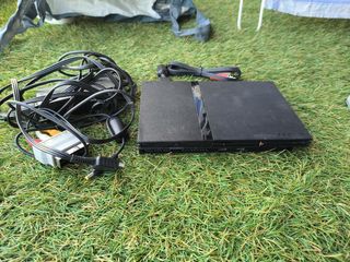 Lote PlayStation 2 con juegos y accesorios