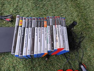 Lote PlayStation 2 con juegos y accesorios