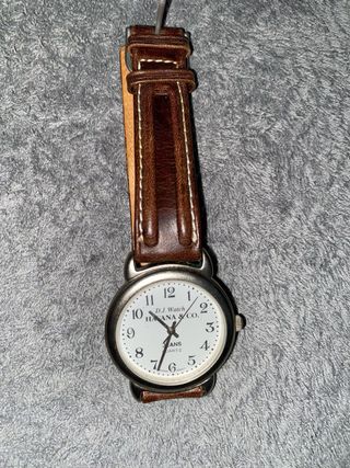 Orologio da polso grigio o marrone