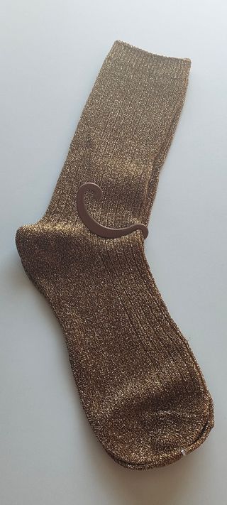 Calcetines dorados de fiesta sin estrenar