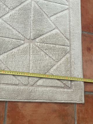 Alfombra beige geométrica