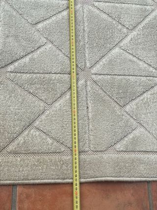 Alfombra beige geométrica