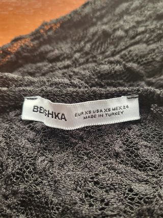 Top negro asimétrico XS Bershka