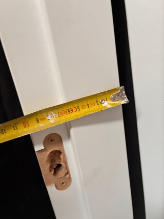 Puerta blanca con manilla